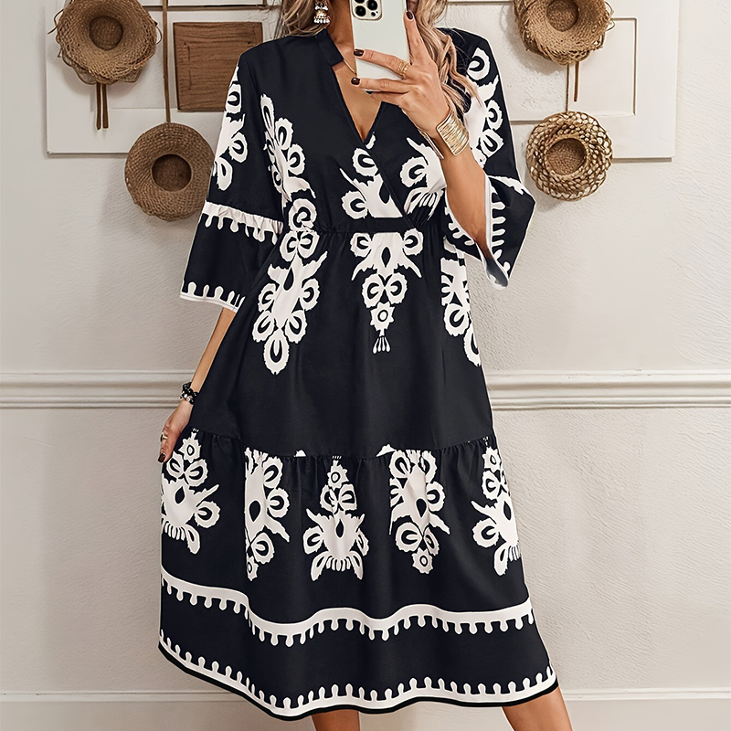đ„LĂ€ssiges Kleid mit Print und V-Ausschnitt