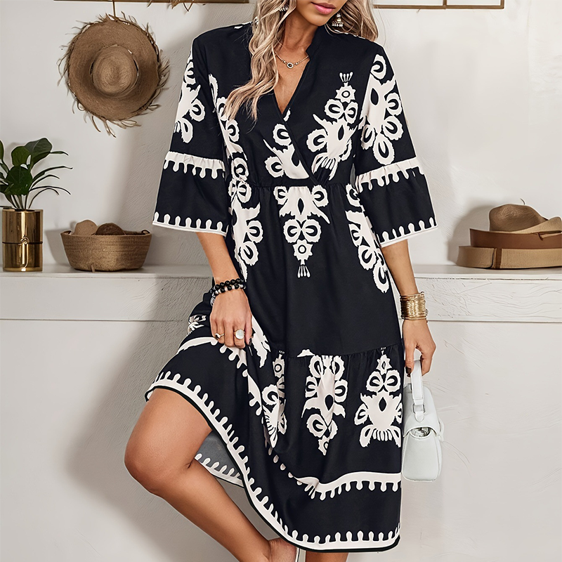 đ„LĂ€ssiges Kleid mit Print und V-Ausschnitt