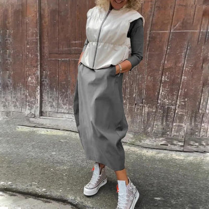 Einfaches, elegantes Damenkleid mit langen Ärmeln und Tasche