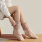 Wiederaufladbare beheizte Socken mit Kräuterpackungen