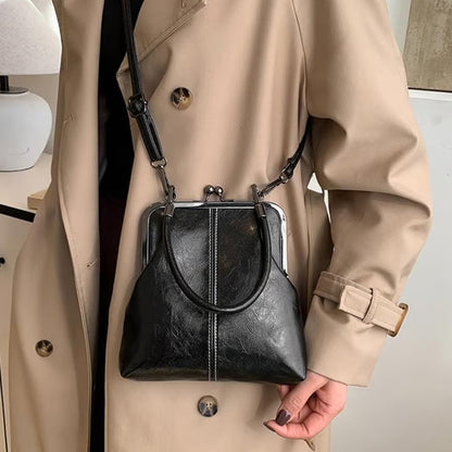 🔥 Blitzsensation! 🎀🎀Damen-Umhängetasche mit Kiss-Lock-Verschluss und Tragegriff oben